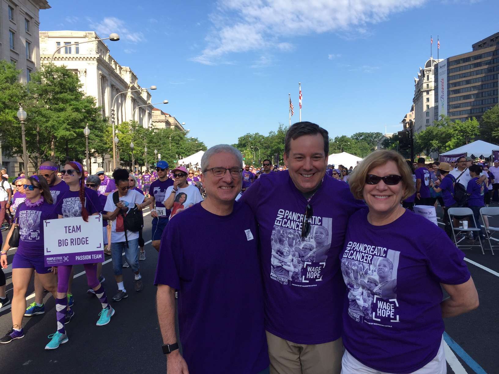 Chief Communications Officer Michael Rosen and Chief Science Officer Lynn Matrisian participate in walk with emcee Ed Henry