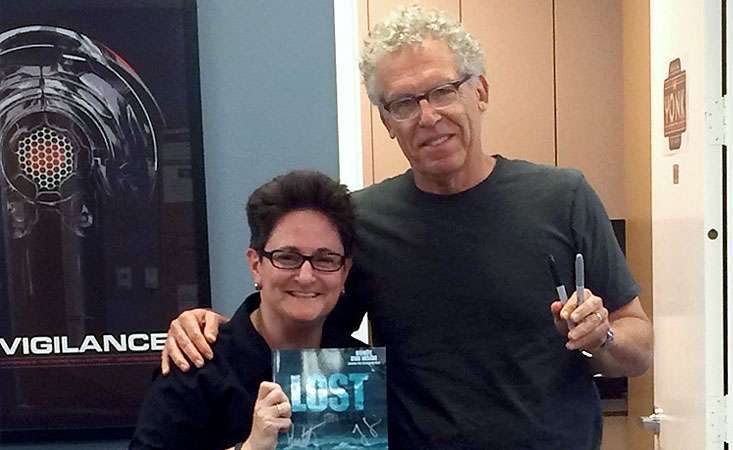 Jo Garfein holds signed Lost collectible with the show’s screenwriter with “LOST” Show Runner Carlton Cuse
