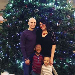 Young pancreatic cancer patient celebrates Christmas with his wife and sons during chemotherapy