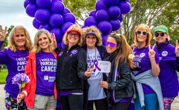 Pancreatic cancer survivor Reesa Levy at PanCAN’s PurpleStride (center)